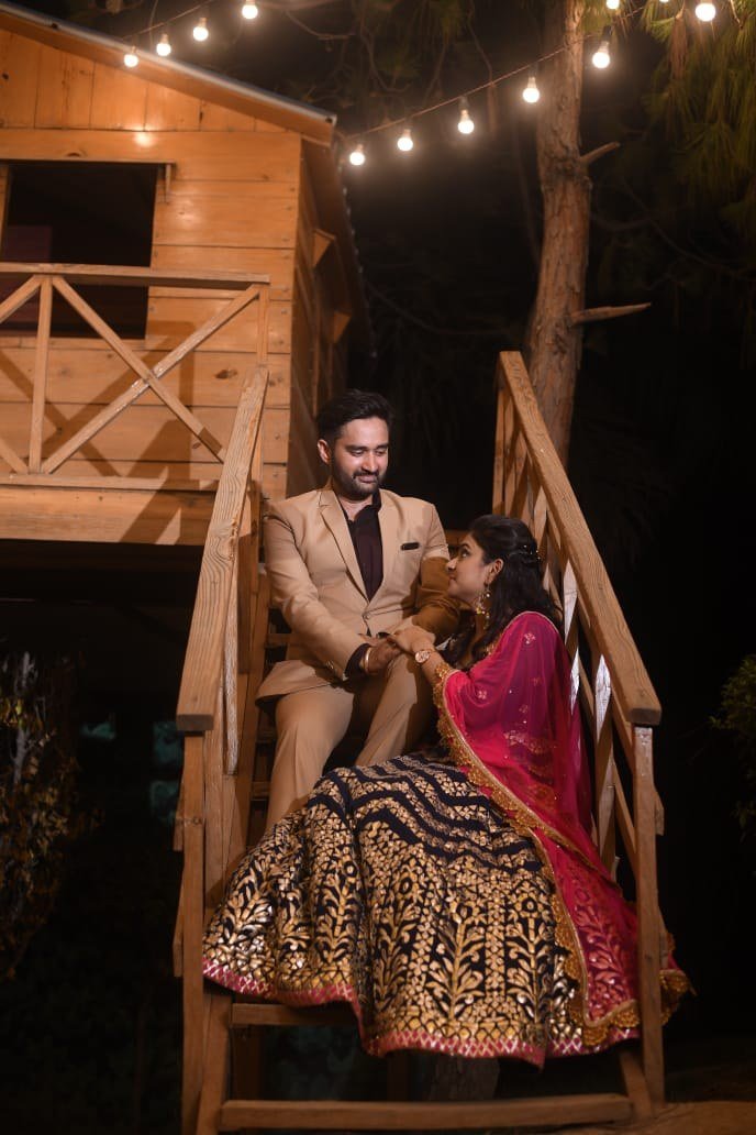 Indian wedding couple in a warmly lit venue
